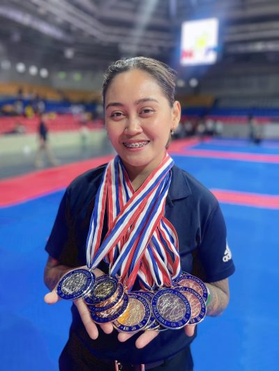 Coach Flora Iloilo Taekwondo Academy with Medals